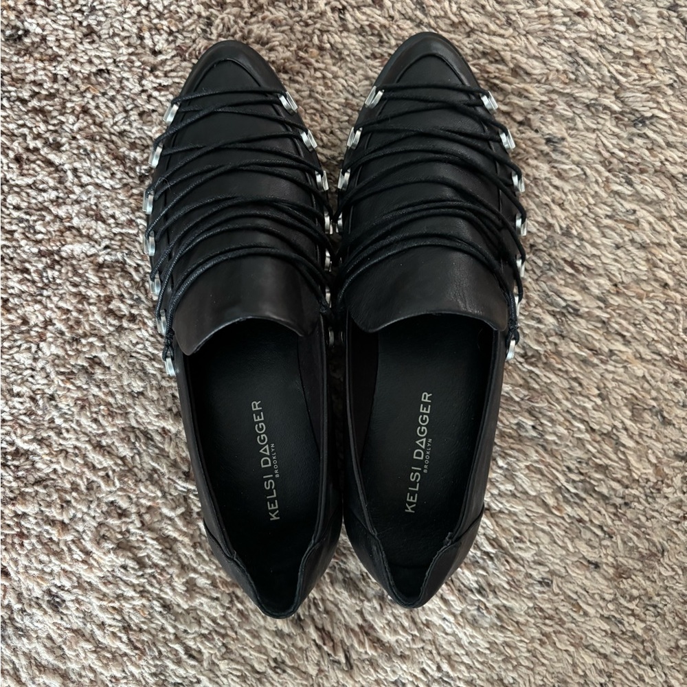 Kelsi Dagger Black Flats Modern Slip-On Design